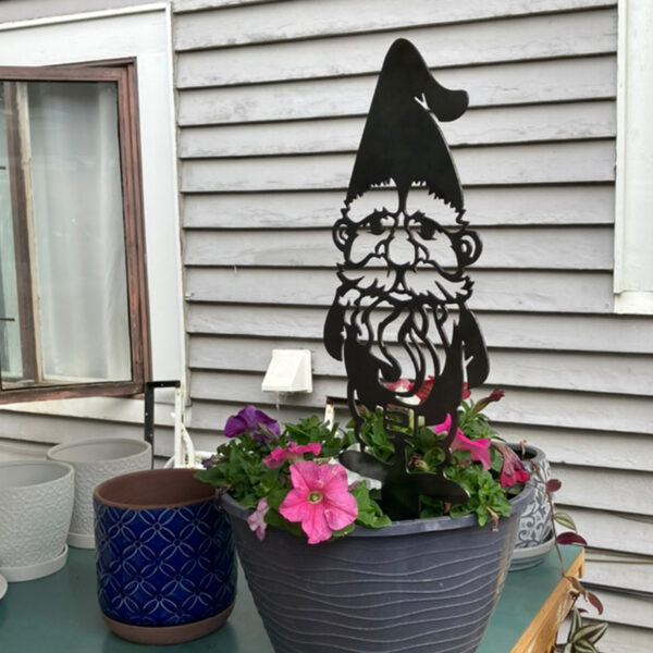 Gnome in flower pot form Leavenworth Metal Co.